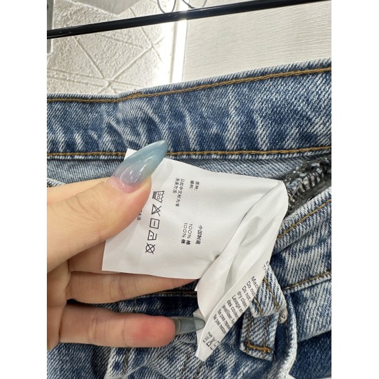 Jeans a Vita Alta con Strass e Piega – Denim Curvo a Gamba Ampia con Dettagli Strappati