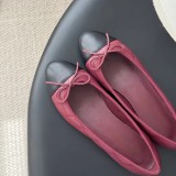 Quilted Pink Leather Ballet Flats with Black Toe Cap